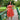 Plus size model wearing Red Polka Dot Vintage Style Sleeveless Dress standing on a wooden bridge