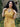 Woman wearing 1940s Mustard & Cream Soutache Decor shirtwaister dress, close up portrait
