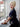 Woman by window showing detail of Navy Blue Soutache Loop Decor dress embroidered collar