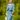 Blonde woman posing in 1940s light blue dress and bolero set with cream handbag and lace gloves