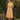 Woman in garden wearing 1940s Vintage Lumber Jill Check Day Dress in Yellow plaid with straw hat